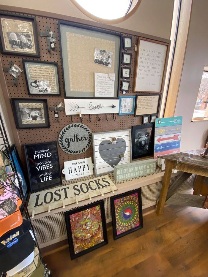 Gift shop display with signs and home décor