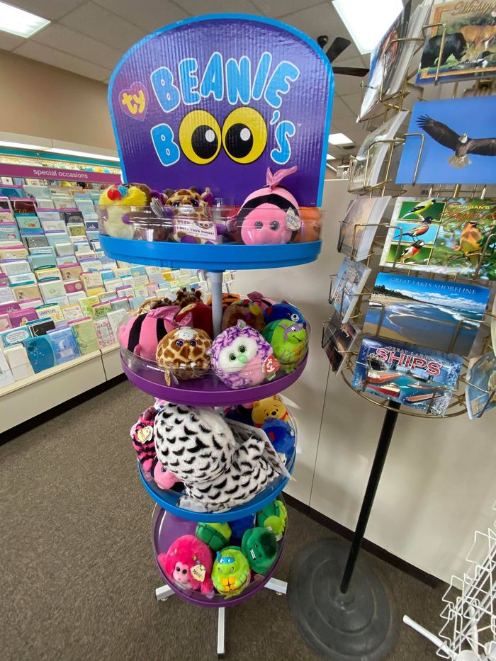 Gift shop display with stuffed animals and seasonal gifts